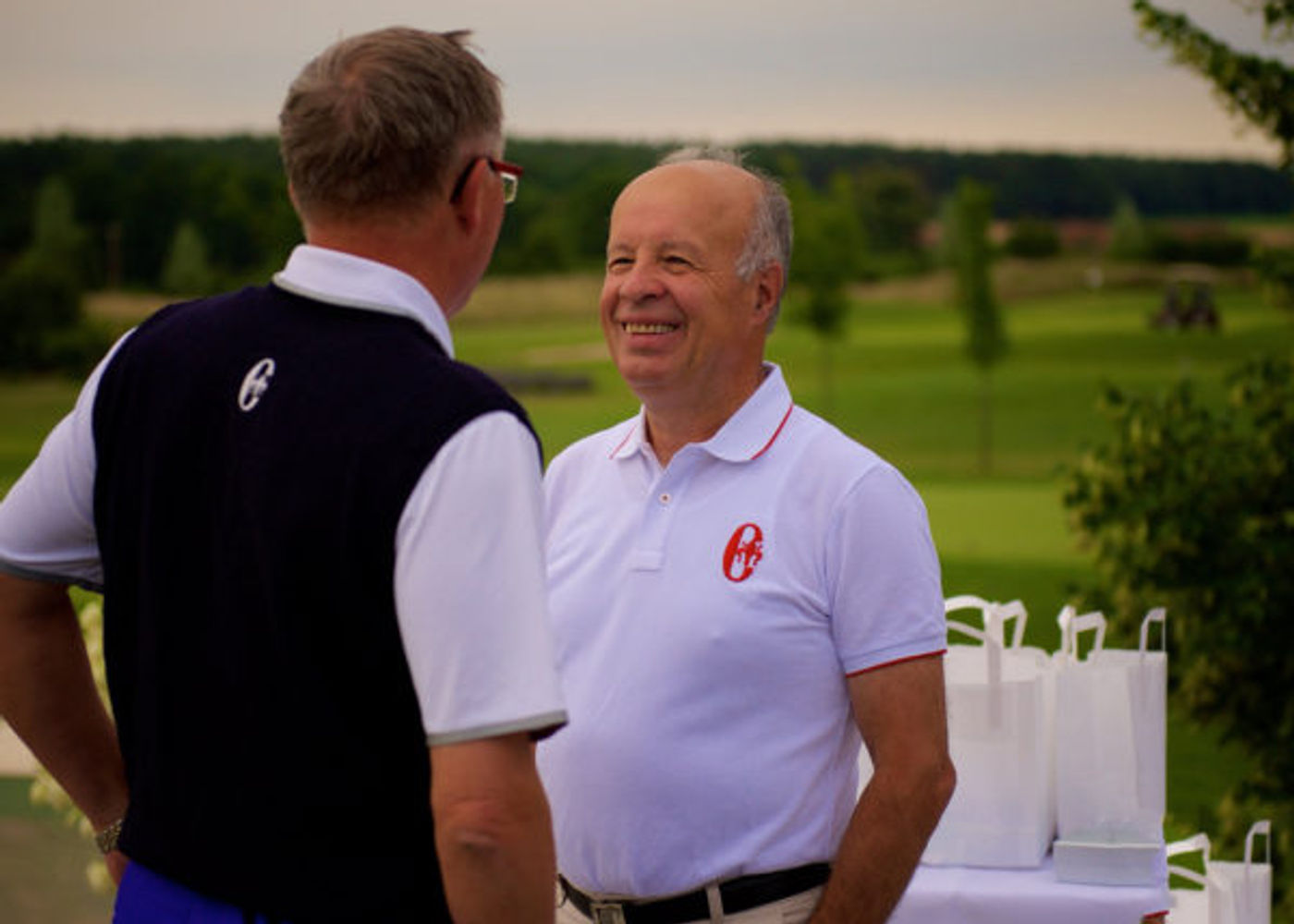 Executive golf meeting on the course
